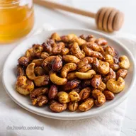 Pikanter Snack Ger&ouml;stete N&uuml;sse mit Honig: 20 Min.